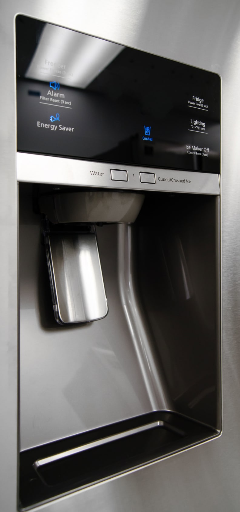 The Samsung RF28HMEDBSR's stylish dispenser has plenty of room for both regular drinking glasses and wider pitchers.