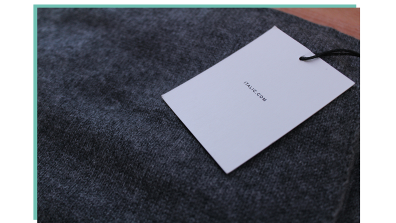 Close-up photograph of an Italic clothing tag.