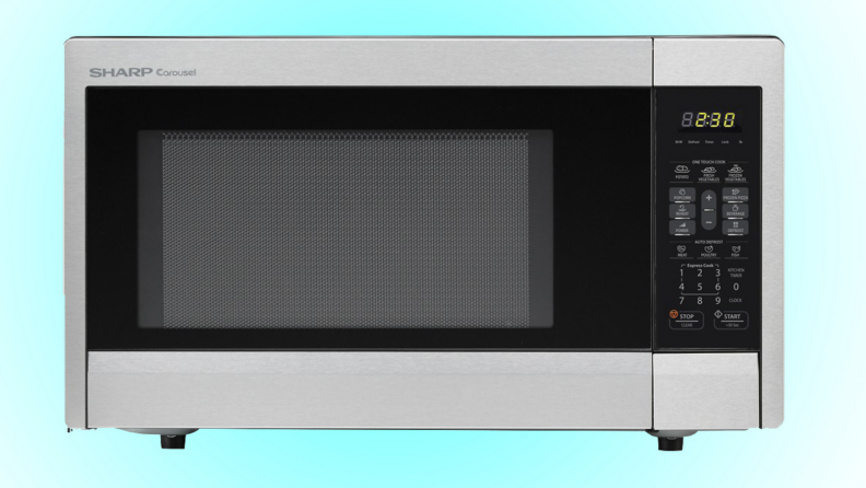 A Sharp microwave against a light blue background.