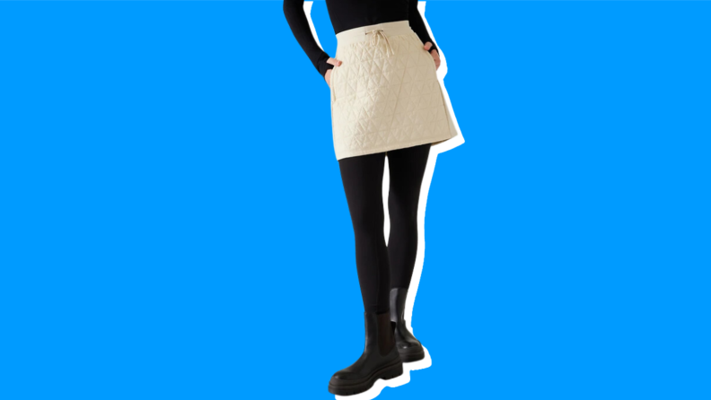 A model wearing a white puffer skirt.