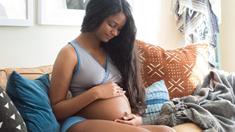 Pregnant woman wearing bra