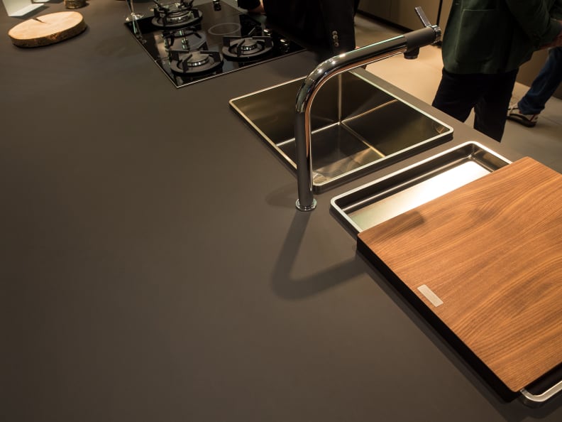 Some of Arrital's countertops feature Fenix NTM nanotech matte material. It's self-healing, anti-fingerprint, anti-reflective, and soft-touch.