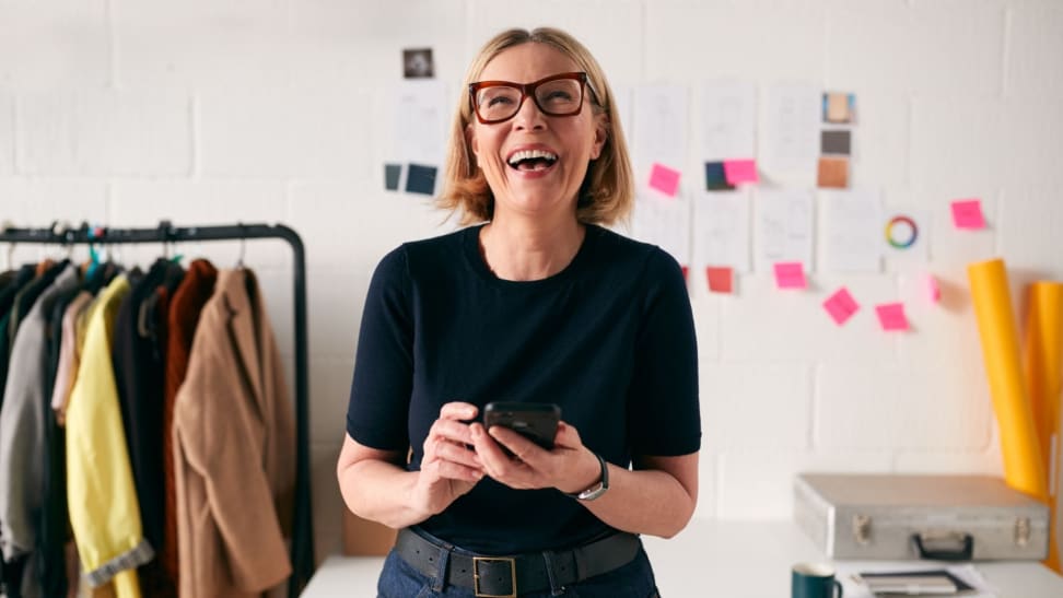 A businesswoman looking at her retirement account