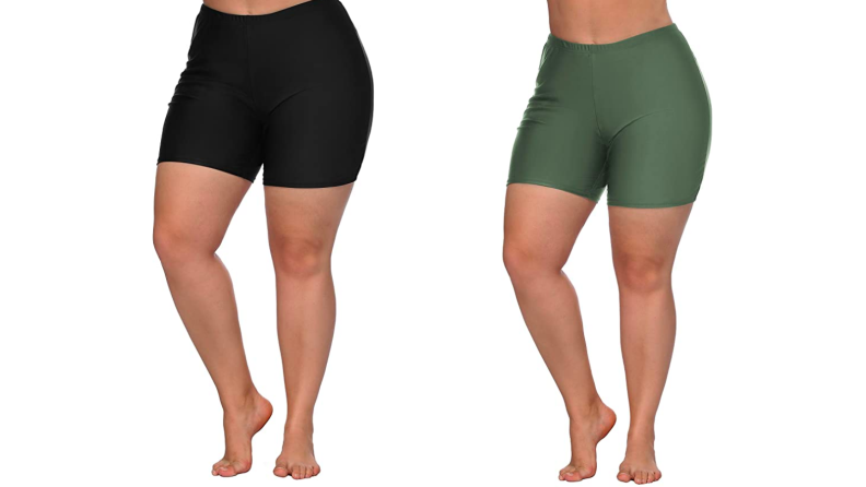 Two images of the same pair of high waisted swim board shorts, one in black and the other in a heathery green.