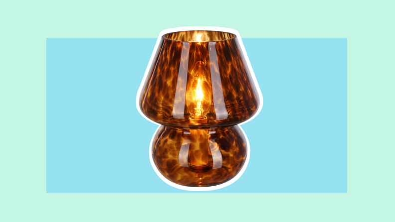 Tortoise colored glass mushroom-shaped lamp to be placed in your dorm room.