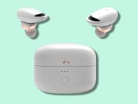 A set of air purifying ear buds against a teal background.