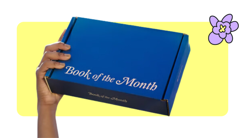 hand holding up blue Book of the Month Club Subscription box