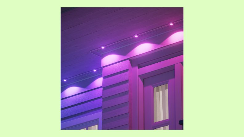 Purple lights shine in sockets outside.