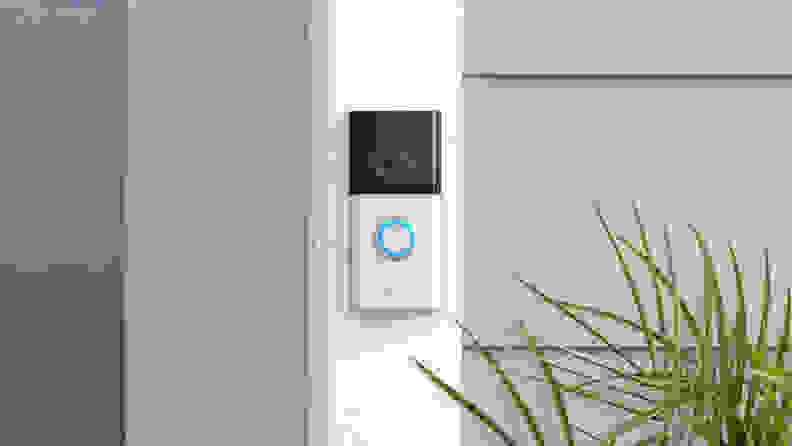 Ring video doorbell next to door