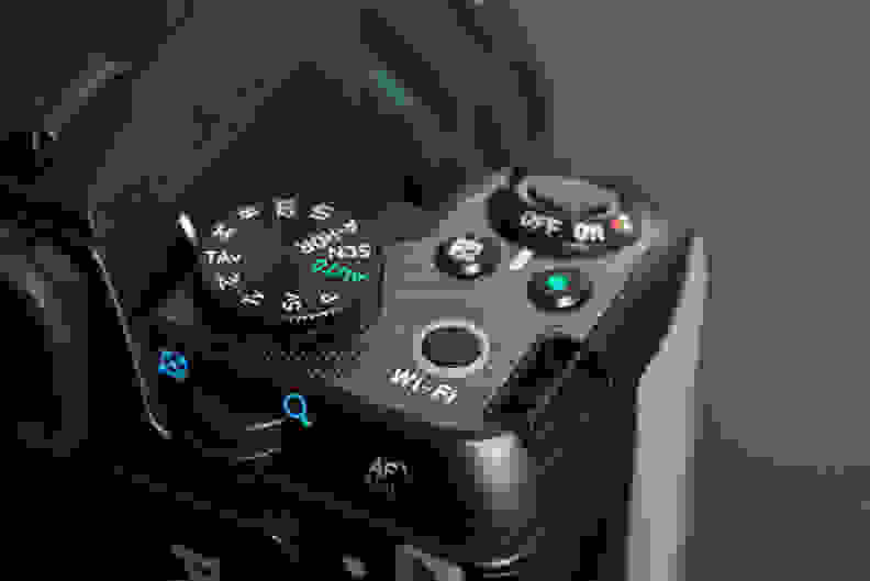 A photo of the Pentax K-S2's top controls.