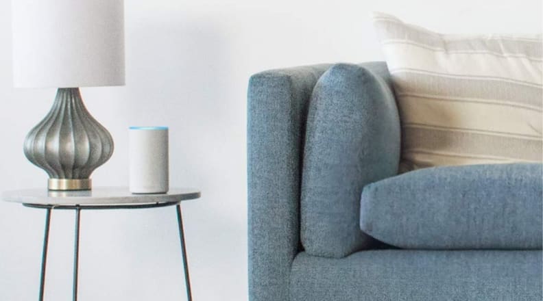 Amazon Echo on table by couch