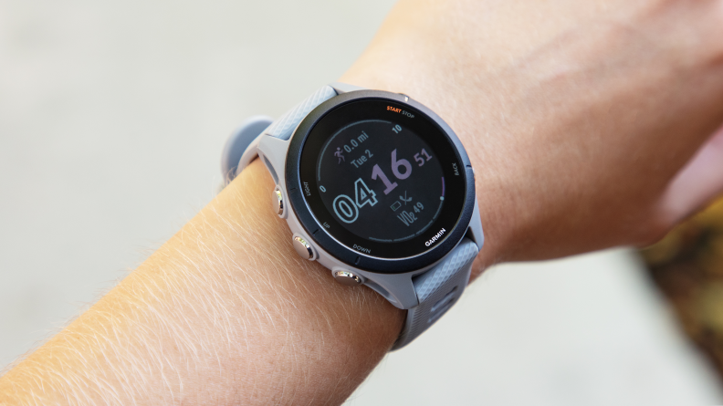 Close-up of woman's wrist wearing the Garmin Forerunner 255S.