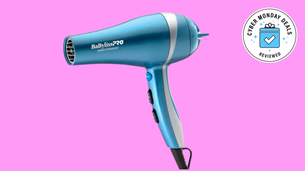 A blue hair dryer against a pink background.