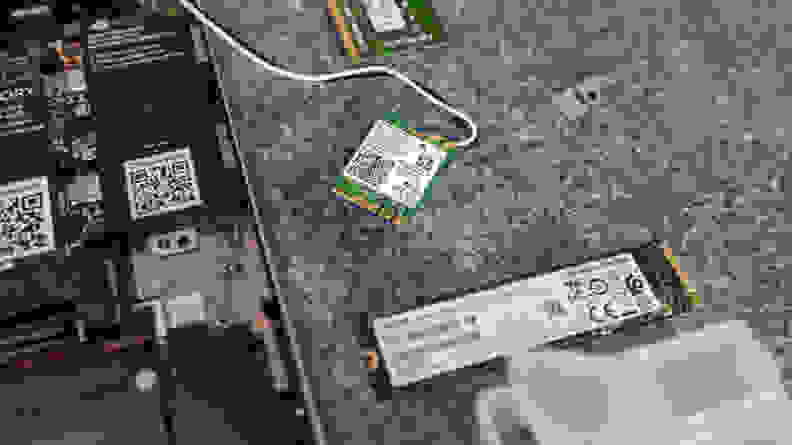 A closeup of the WiFi module and storage drive.