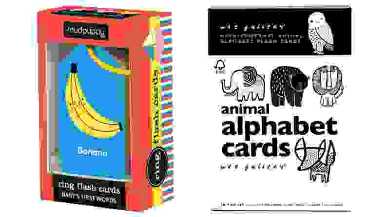 Multi-colored children's card game in box. Black and white children's alphabet cards.