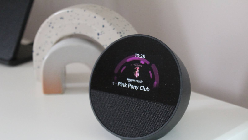 Close-up of the Echo Spot displaying Amazon Music.