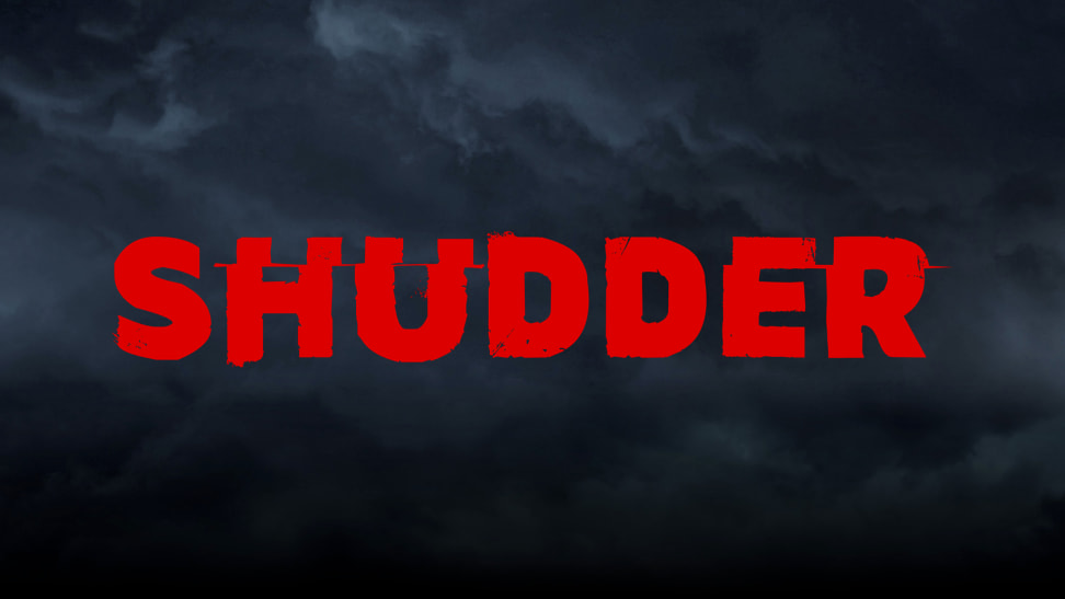 The red Shudder logo is centered against a dark, smoky backdrop.