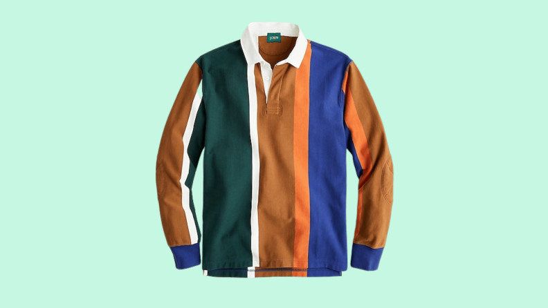 A striped rugby shirt against a green background.