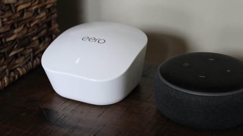 One of our Eero units lives in the living room with Alexa.