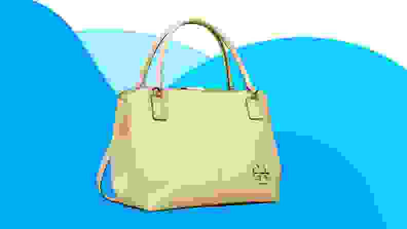 A white handbag against a blue background.