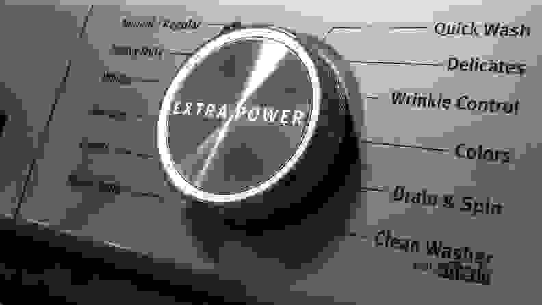 A giant, imposing cycle select dial with an all-caps "EXTRA POWER" written across its center.
