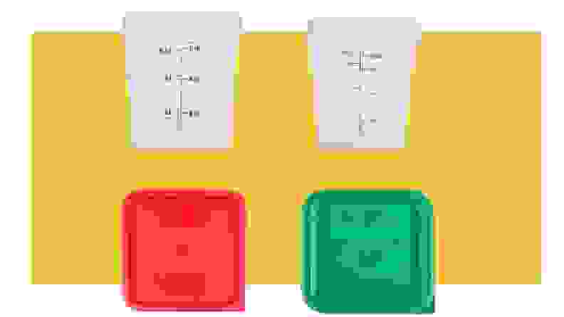 Two storage containers on a yellow background