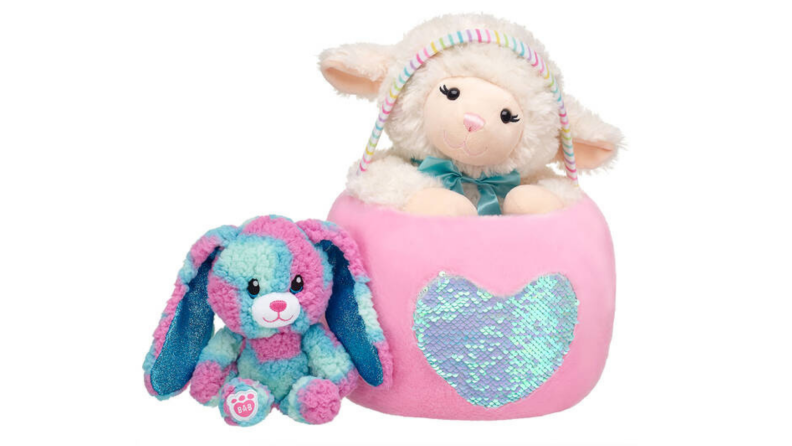 A plush Easter basket includes stuffed animals of a dog and lamb.