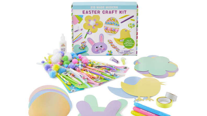 Easter craft kit with bunny, egg, and chickadee paper cutouts, pompoms, markers, and pipe cleaners.