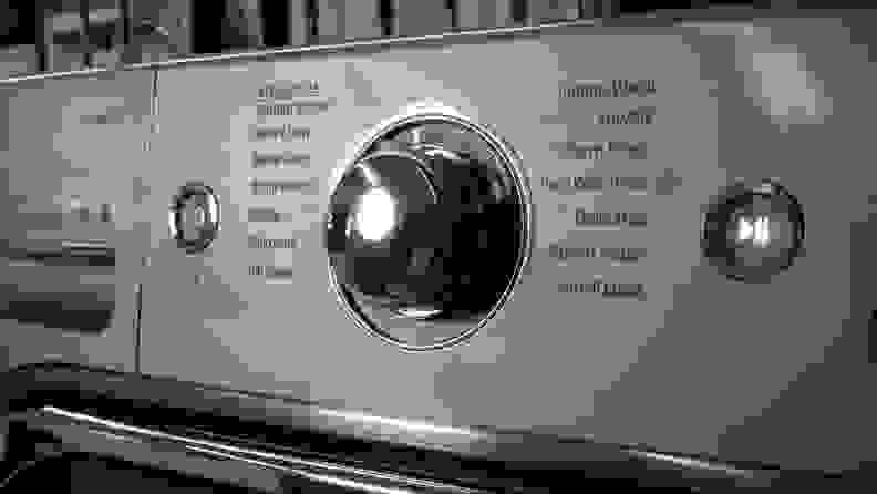 A close-up of the LG WM8100HVA front-load washer's cycle selection dial.