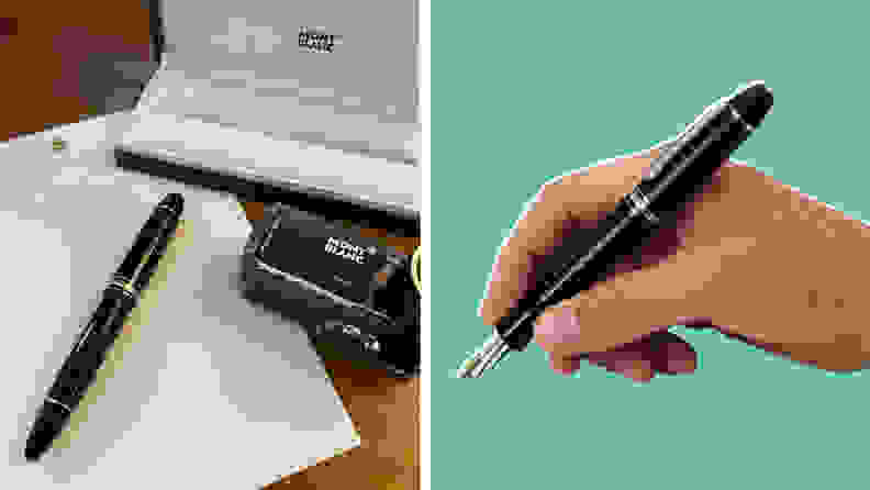 A hand holding a black fountain pen and the pen and ink and case on a desktop.