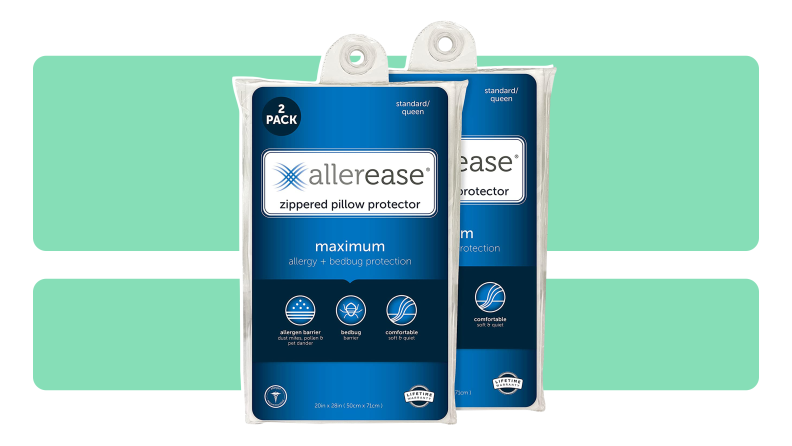 Two blue packages of AllerEase Maximum Pillow Protector side-by-side, on a green background.