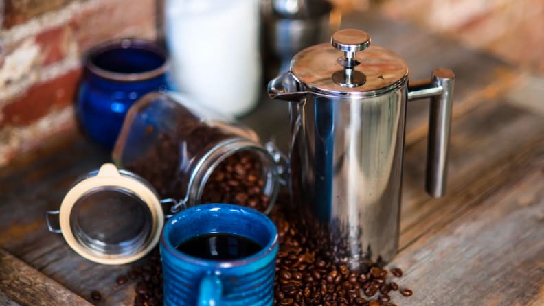 Coffee and coffee beans on a countertop.