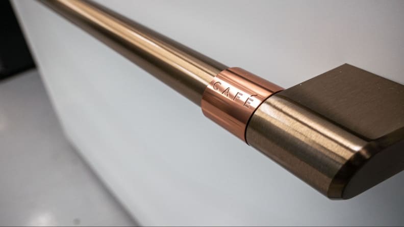 Close-up shot of the bronze handle bars.