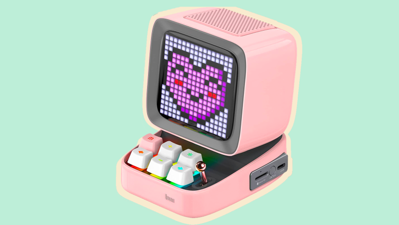 Pixel art machine on a green background