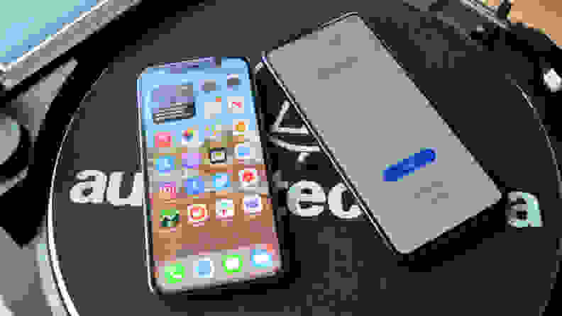 An iPhone and an Android phone lying side by side