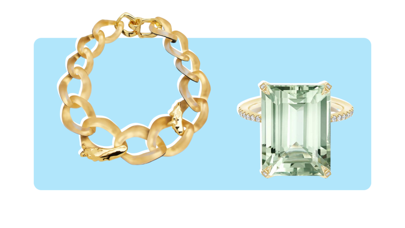 A gold ring with a large center gemstone and an oversized chain link necklace with gold accents.