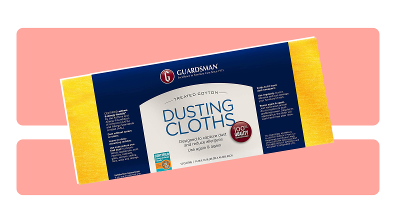 A yellow and blue package of Guardsman Dust Cloths on a pink background