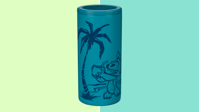 Blue Stitch tumbler on a green background