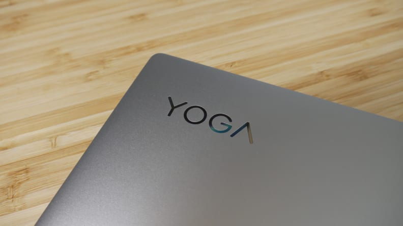Yoga brand logo on the outside of a Lenovo Yoga 9i