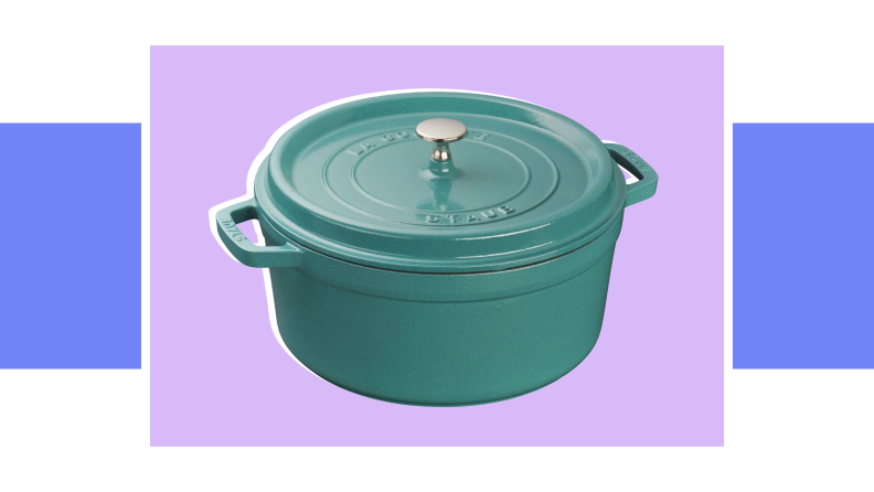 An image of a teal round Staub cocotte with a ceramic lid.