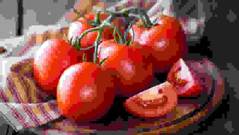 Tomatoes in basket - Things you should never put in your refrigerator