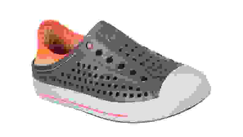 An orange and black slip-on water shoe