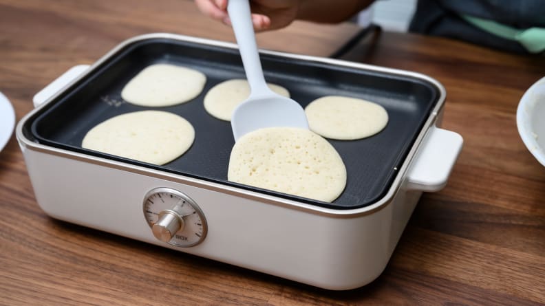 Flipping pancakes with A4Box's spatula.