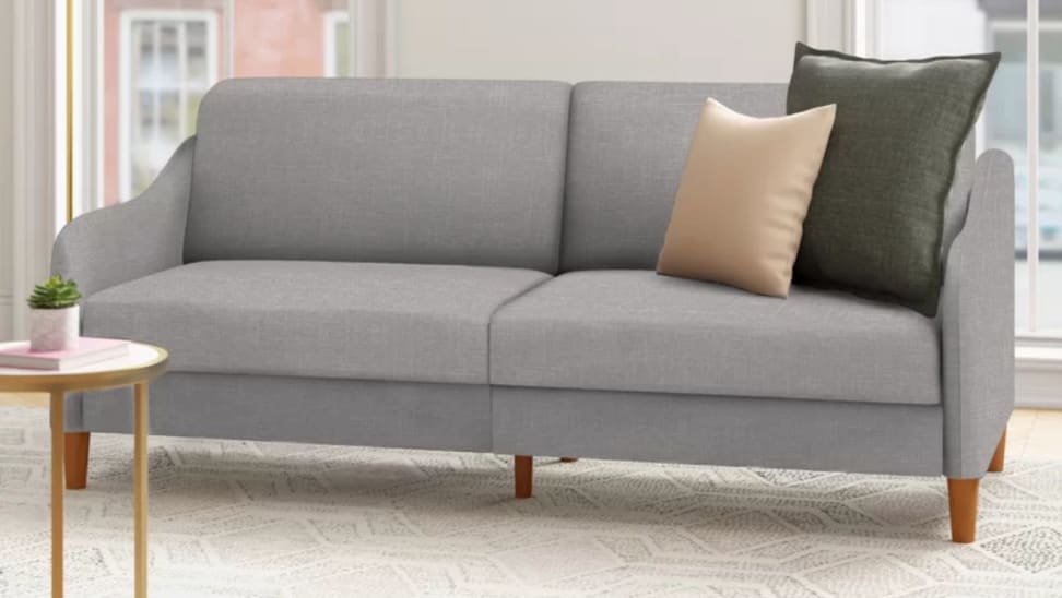 A gray Wayfair couch in a living room.