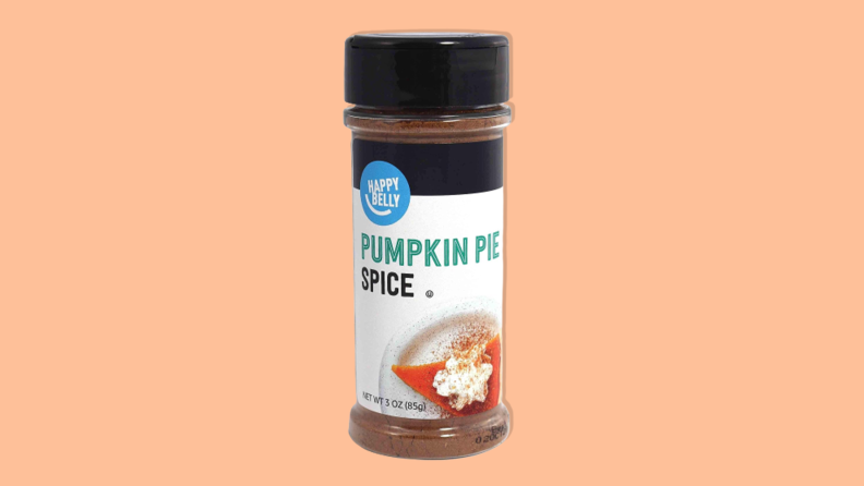 Happy Belly Pumpkin Pie Spice on orange background.