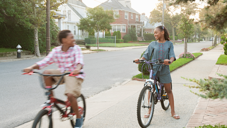 Boy and girl riding bicycles