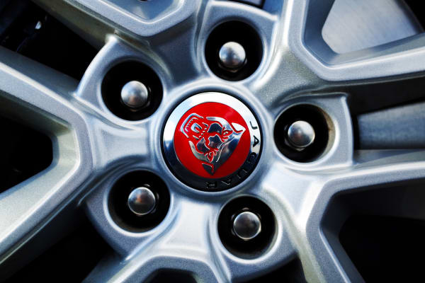 The iconic "growler" Jaguar logo is found all over the car, even on the wheels.