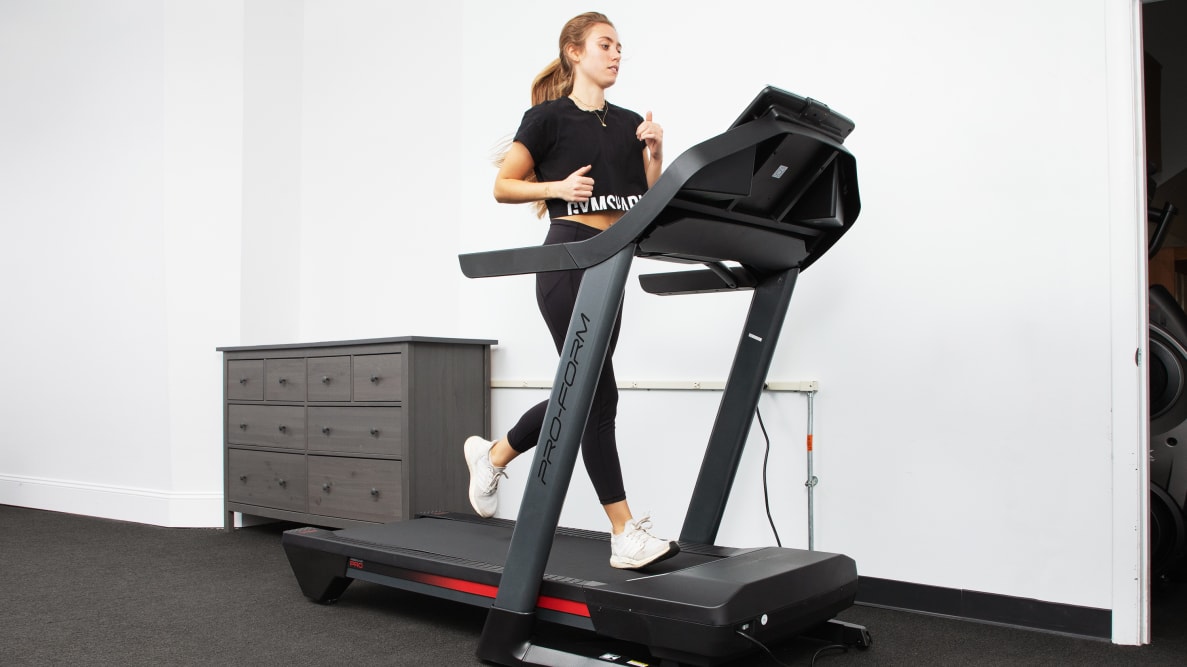 A woman running atop the ProForm Pro 2000 treadmill.