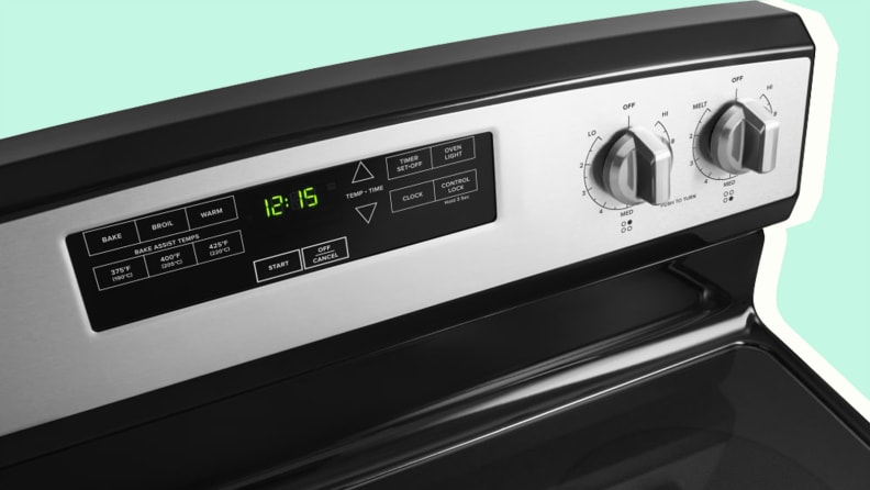 Control panel on an electric stainless steel range and oven.
